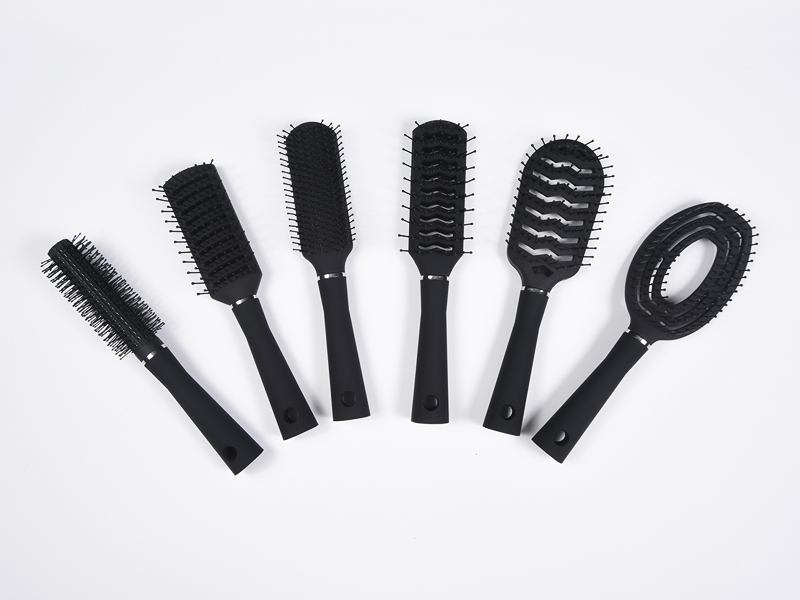 Spazzola per capelli con sfiato per cuscino con rivestimento in gomma