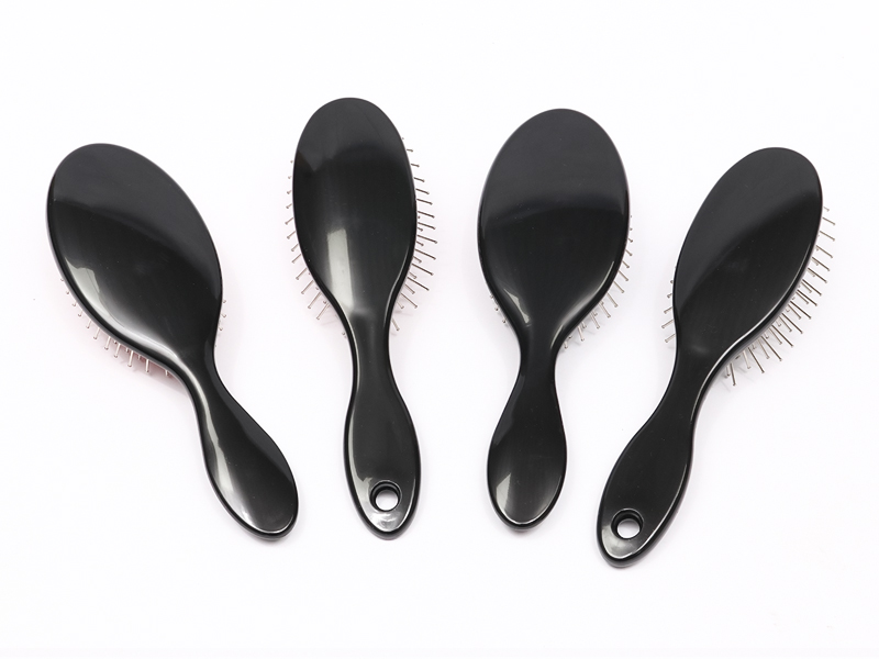 Spazzola per capelli massaggiante con testa in plastica