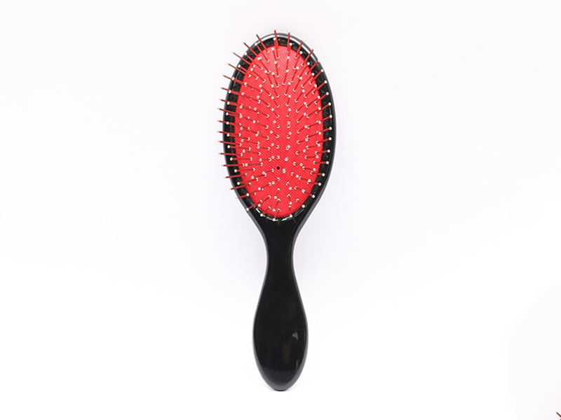 Spazzola per capelli massaggiante con testa in plastica