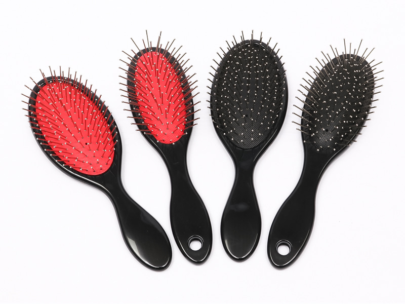 Spazzola per capelli massaggiante con testa in plastica