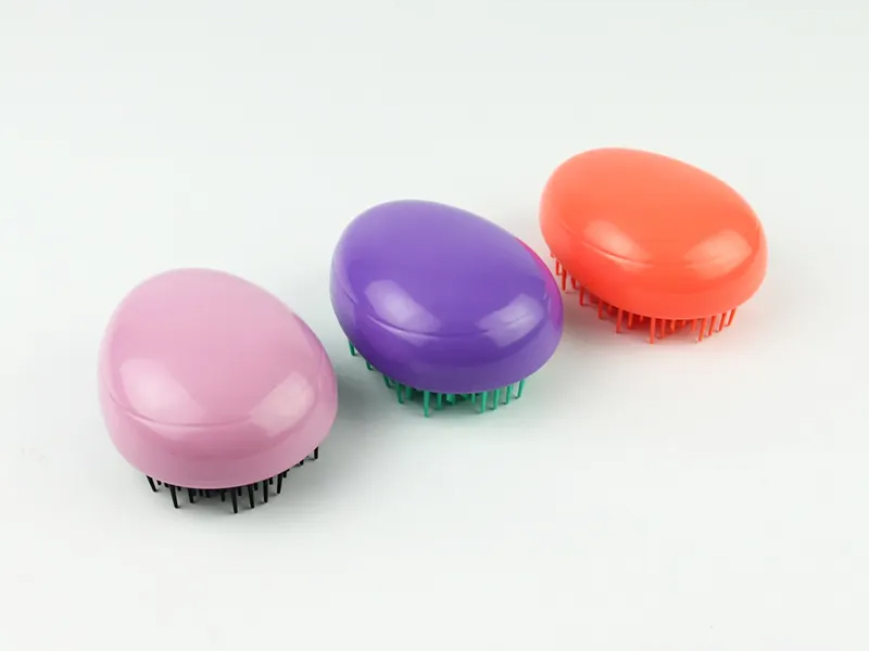Mini spazzola per capelli per bambini a forma di uovo