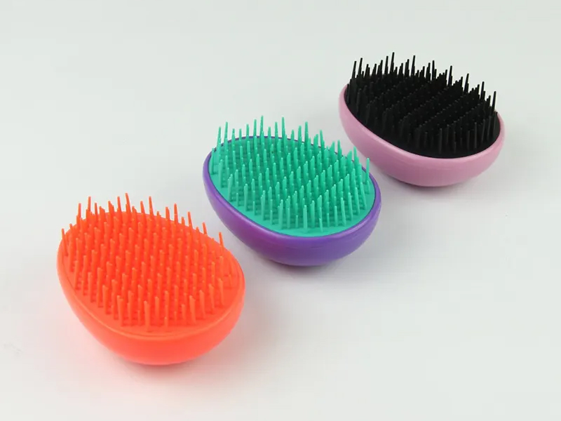 Mini spazzola per capelli per bambini a forma di uovo