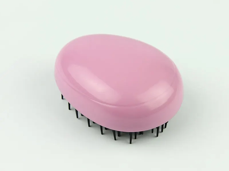 Mini spazzola per capelli per bambini a forma di uovo