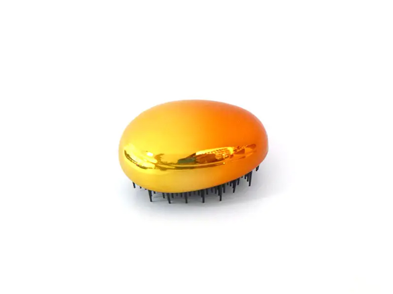 Mini spazzola per capelli districante elettrolitica a forma di uovo