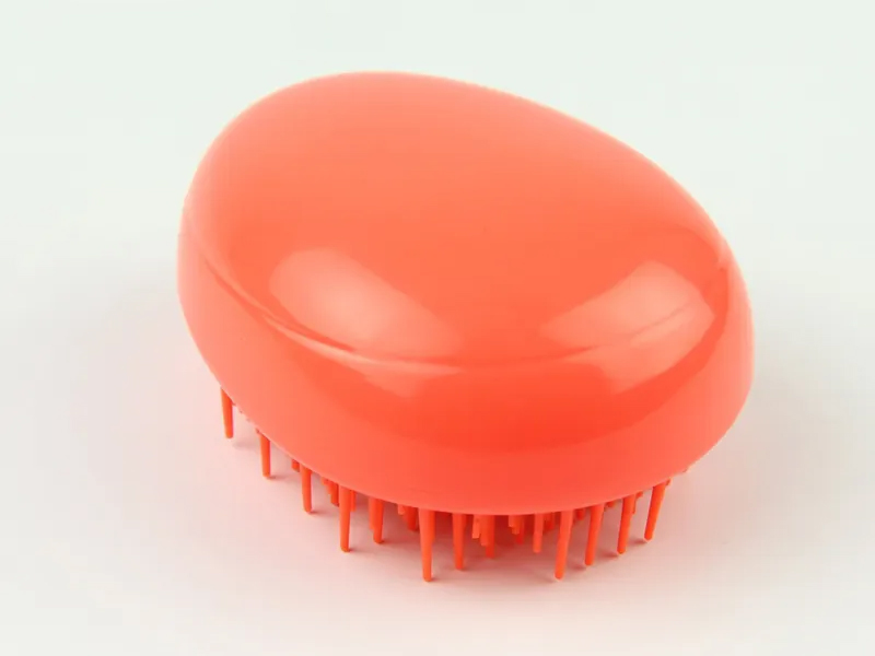 Mini spazzola per capelli per bambini a forma di uovo