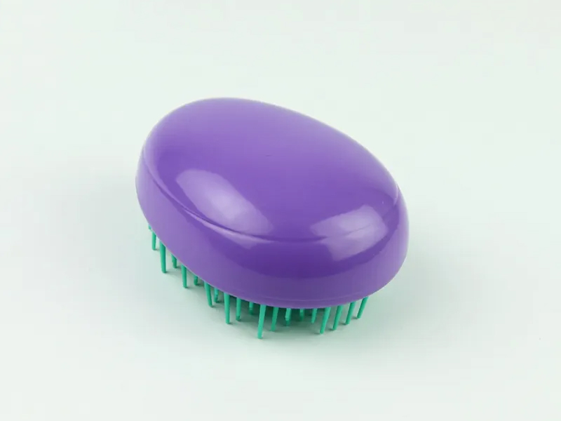 Mini spazzola per capelli per bambini a forma di uovo
