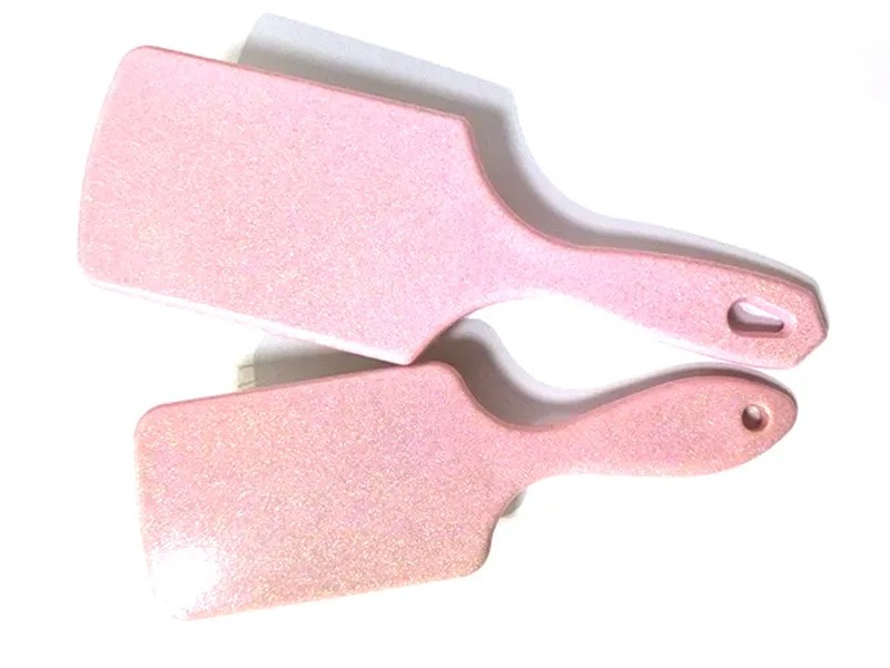 Spazzola per capelli a paletta fantasia in plastica rosa