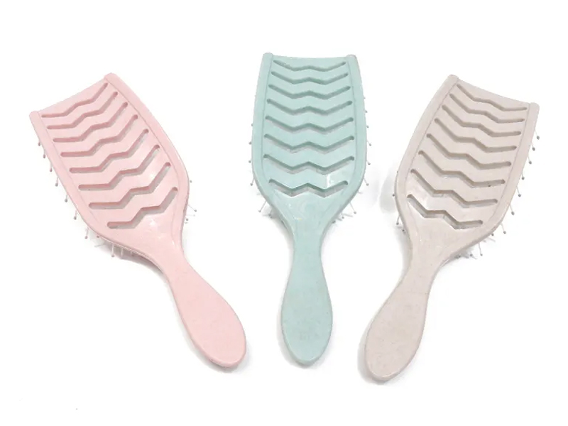 Spazzola per capelli districante curva per massaggio colorato