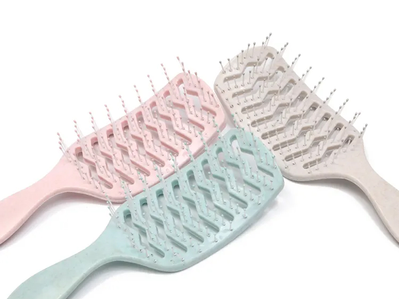Spazzola per capelli districante curva per massaggio colorato