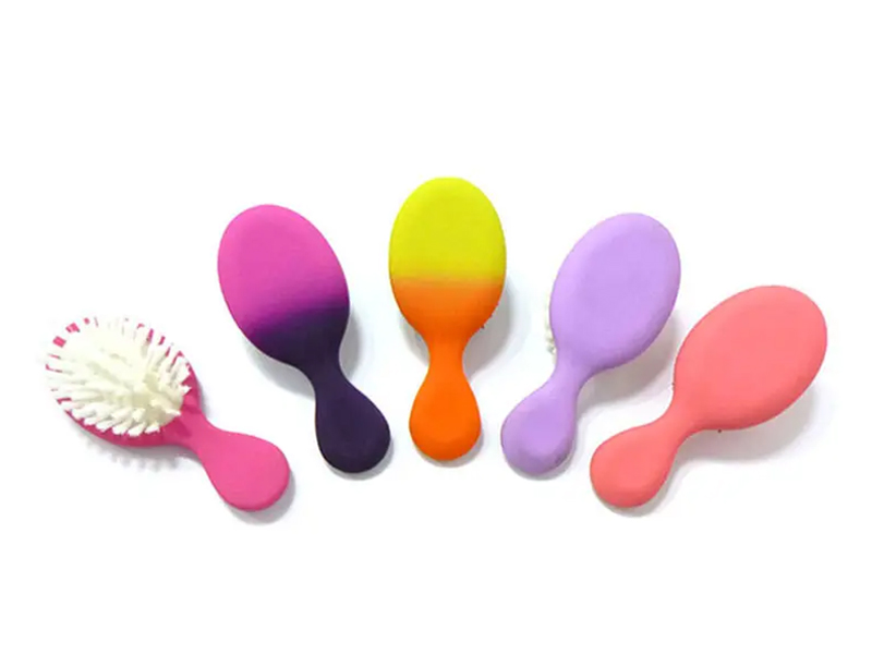 Mini spazzola per capelli districante colorata per bambini