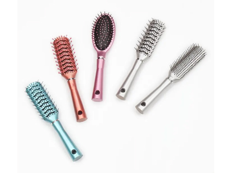 Vari set di spazzole per capelli in plastica fantasia