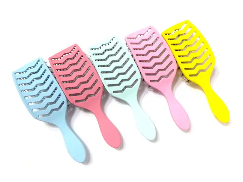 Spazzola per extension per capelli con paletta curva