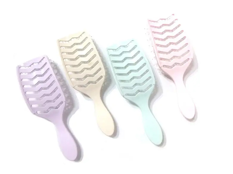 Spazzola per capelli districante rosa portatile in plastica ABS ecologica per massaggio impermeabile