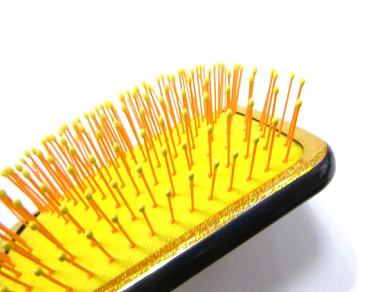 Spazzola per capelli districante bagnata con cuscino d'aria per donna