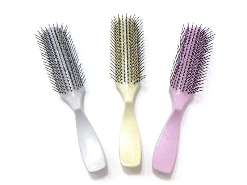Spazzola per capelli districante colorata in plastica