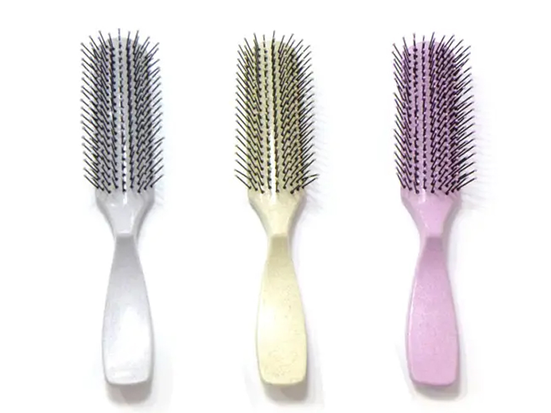 Spazzola per capelli districante colorata in plastica