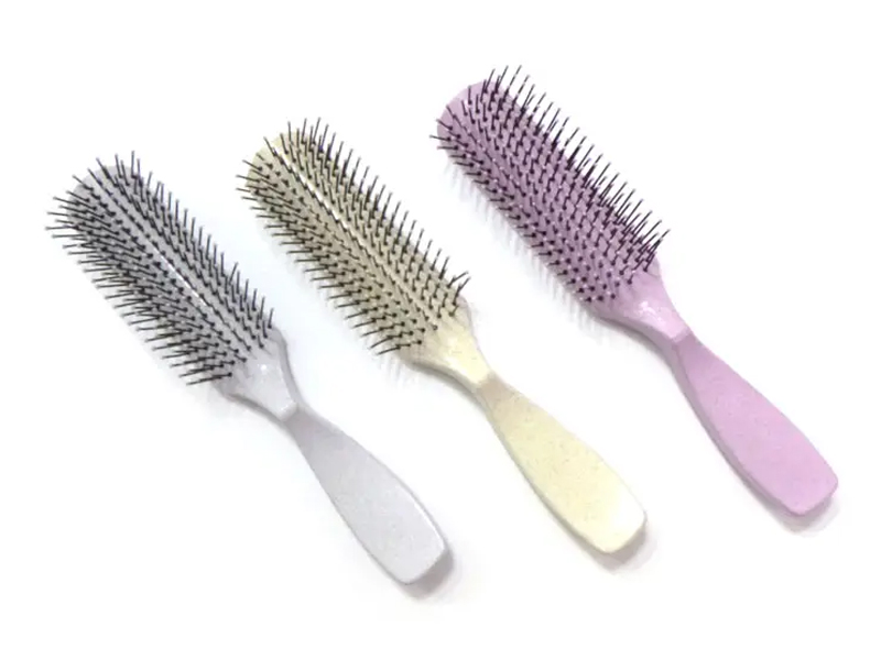 Spazzola per capelli districante colorata in plastica