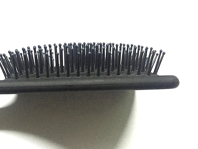 Spazzola per capelli districante in rete con paletta per lo styling dei massaggi