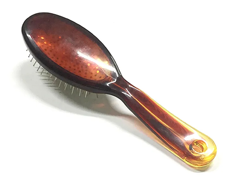 Spazzola per capelli per massaggio alla testa color ambra