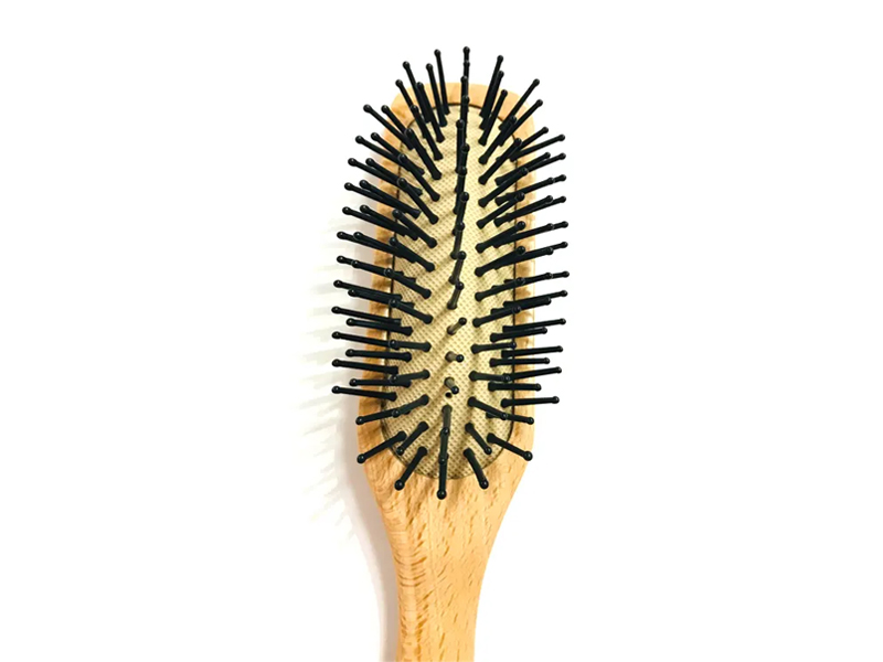 Spazzola per capelli con cuscino in legno naturale