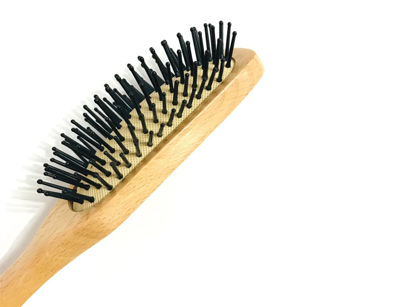 Spazzola per capelli con cuscino in legno naturale