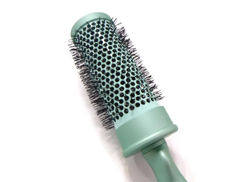 Spazzola per capelli morbida al tatto con rivestimento in gomma rotonda