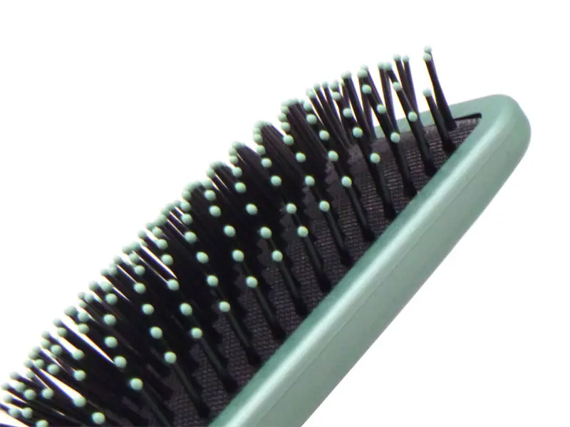 Piastra per capelli con spazzole per asciugatura