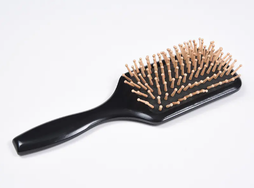 Quali sono i passaggi migliori per utilizzare una spazzola districante per capelli?
